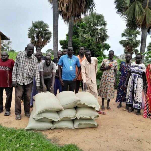 Harvest bags handed to a producer group