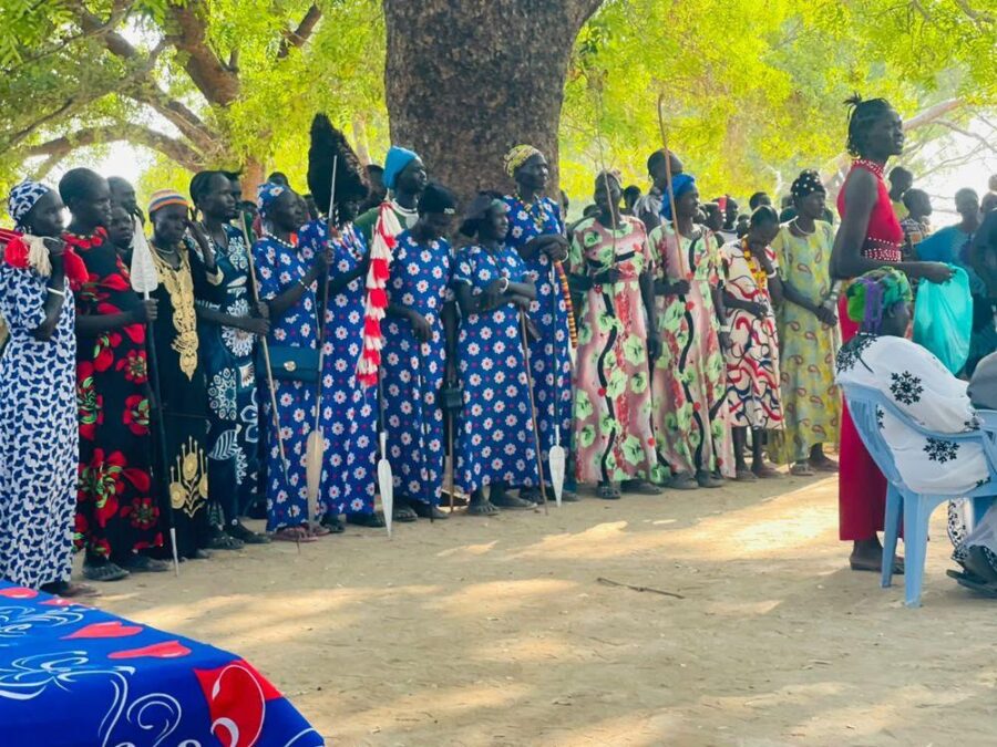 Women assembled in matching dress