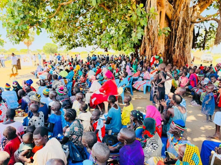 A packed community gathering